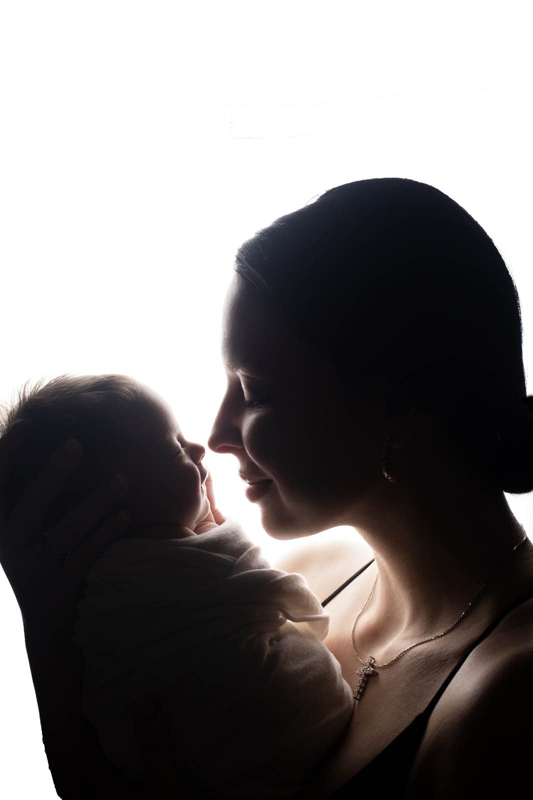 Mother and newborn in soft silhouette — Studio Muffin Tbilisi
