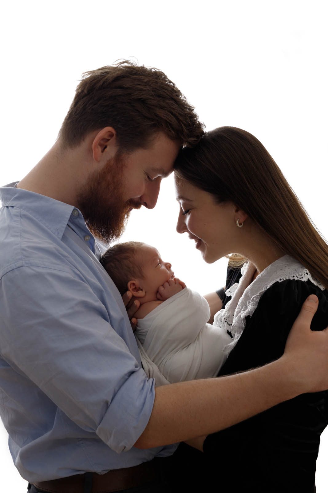 Parents with their newborn, foreheads touching — Studio Muffin Tbilisi