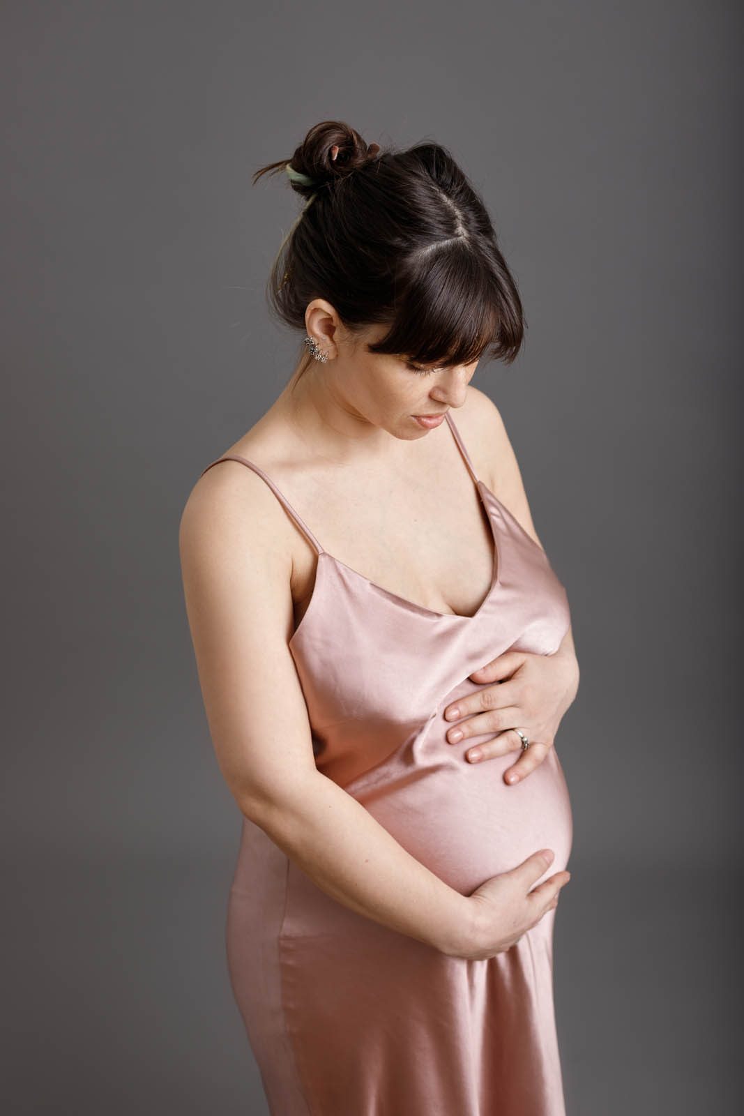 Expecting mother in a blush silk dress — maternity photography Tbilisi